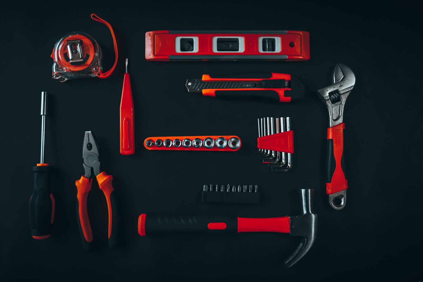 Handyman tools laid out for repair work